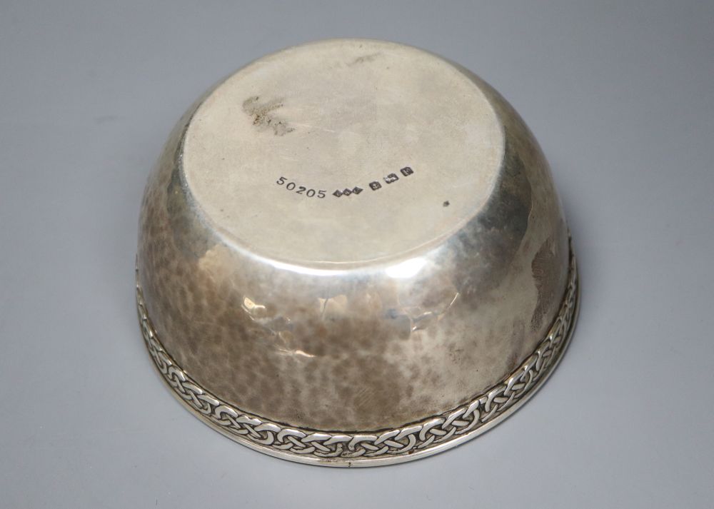 A George V Arts & Crafts Liberty & Co silver bowl with Celtic style border, Birmingham, 1930, diameter 10.5cm, 141 grams,